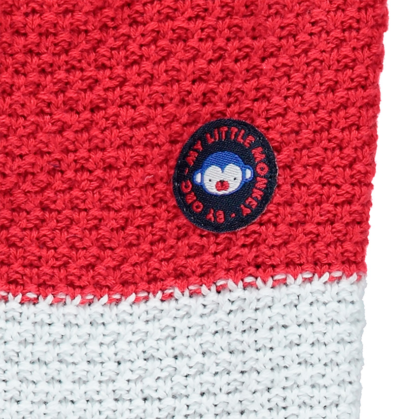 Gilet en maille épaisse avec poches et badge en gomme 