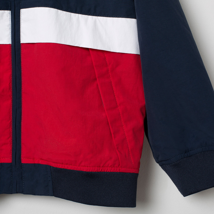 Coupe-vent à capuche tricolore doublé mesh 