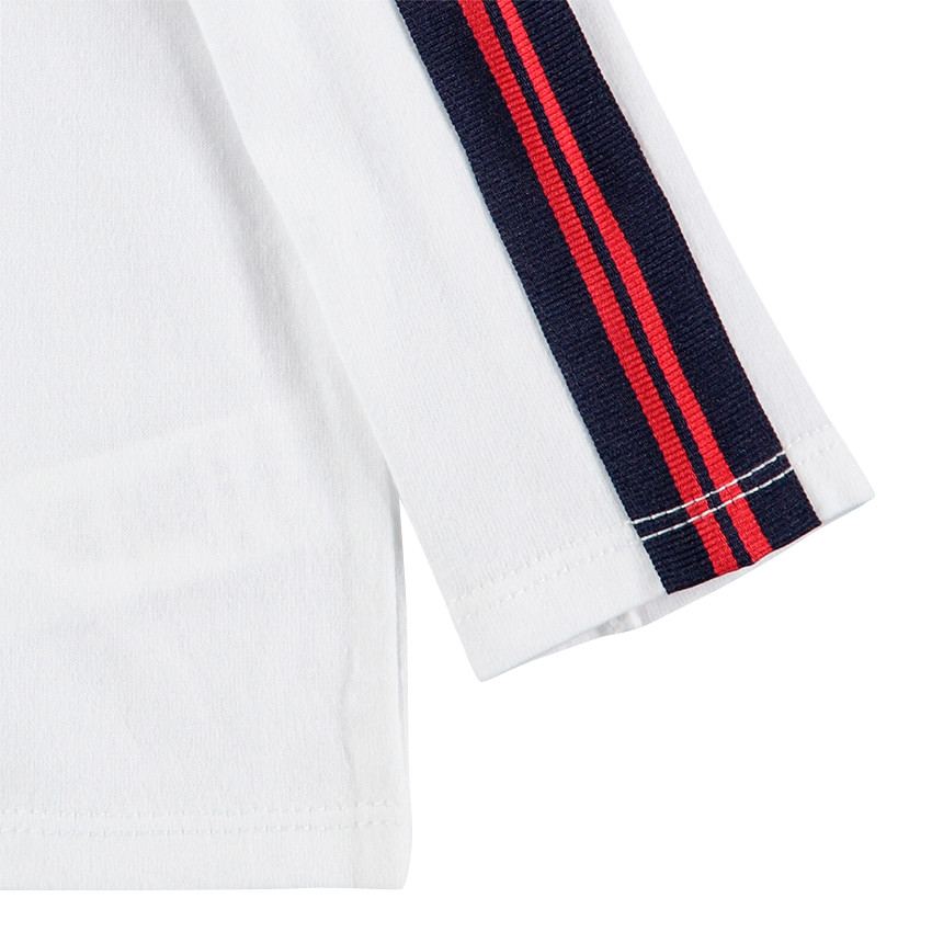 Ensemble polo uni et salopette effet jeans avec singe brodé 