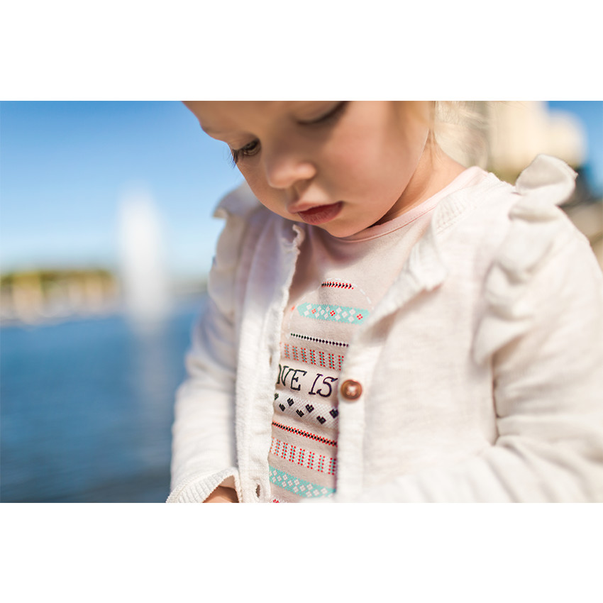 Gilet en tricot chiné avec volants 