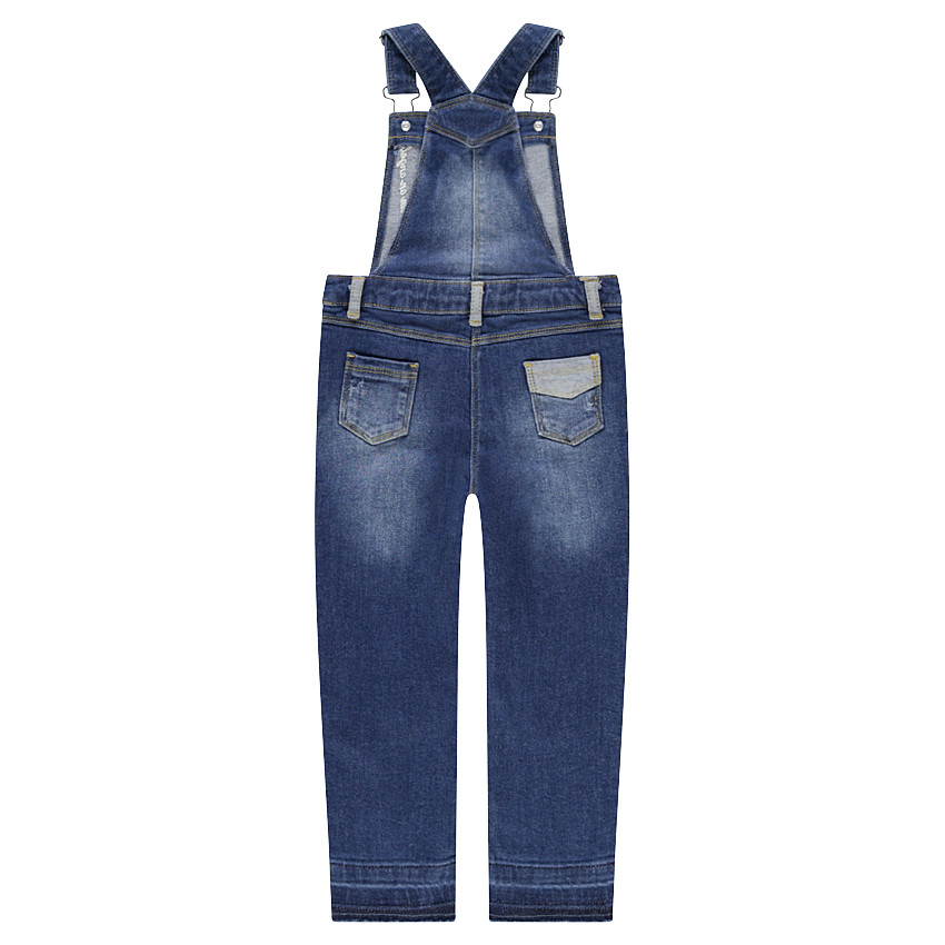 Salopette en jeans effet used avec badges fantaisie et broderies 