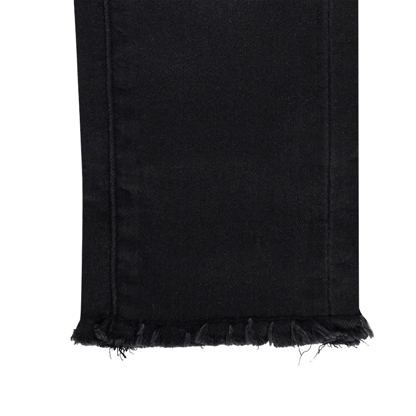 Jeans effet used et crinkle avec déchirures fantaisie 