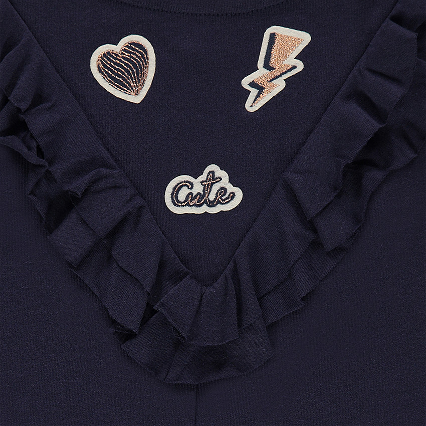 Tunique manches courtes en maille avec volants et badges patchés 