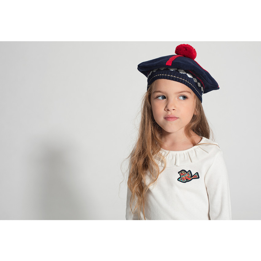 Béret en tricot avec motifs jacquard et pompon 