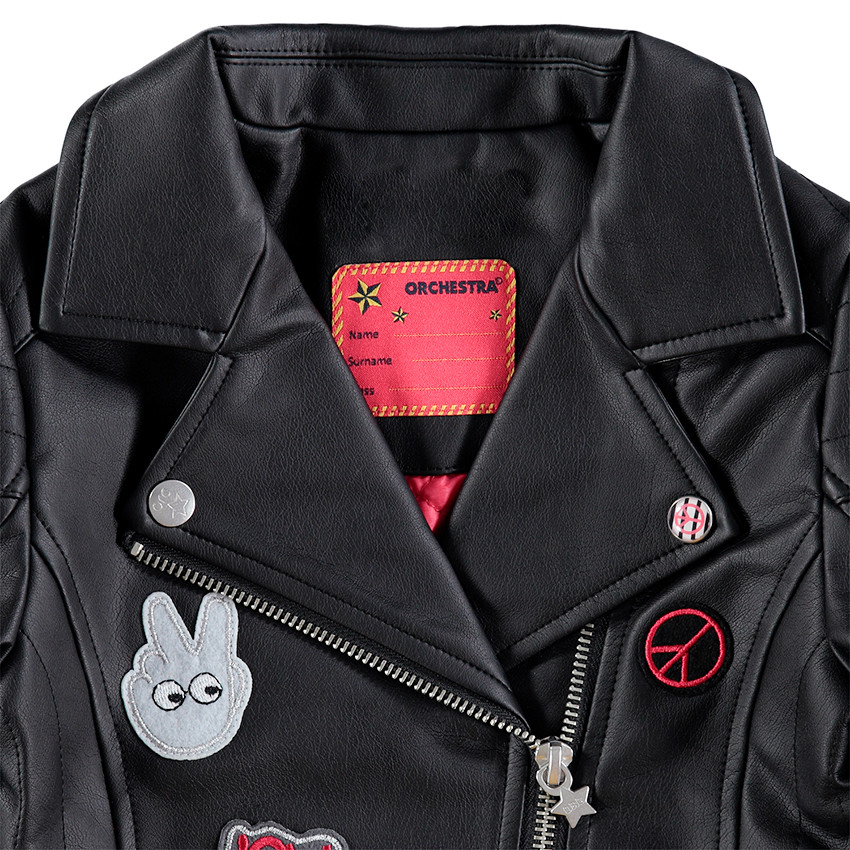 Perfecto en simili cuir avec badges et doublure satin rose 