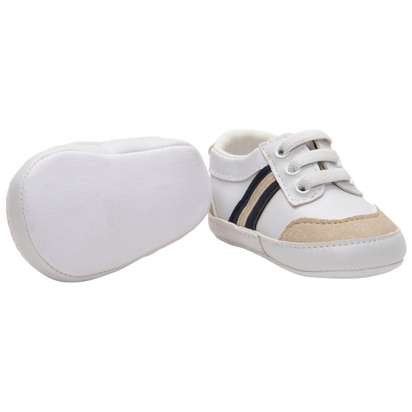 Baskets souples à empiècements et bandes contrastées 