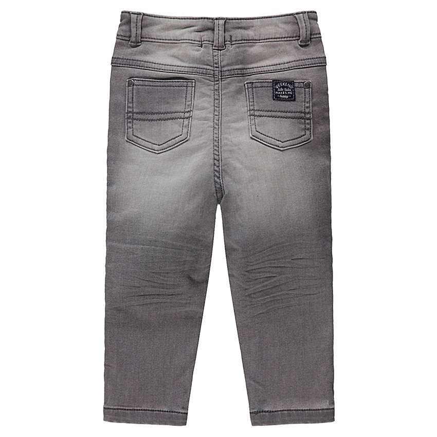 Jean gris effet used et crinkle avec monstres printés sur les genoux 