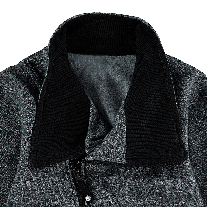 Gilet en molleton avec ouverture en biais et poches zippées 