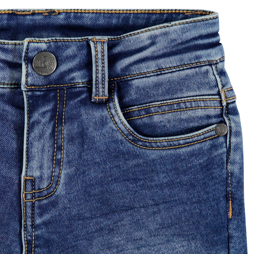 Bermuda en jean effet used à découpes 