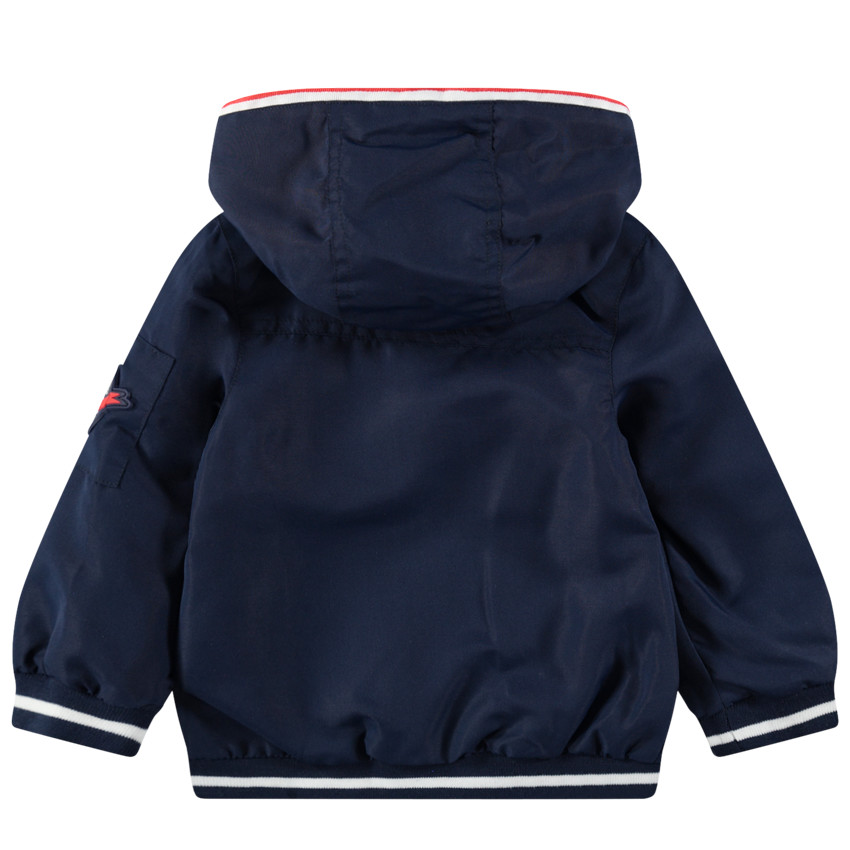 Coupe-vent uni avec doublure en jersey rayé et poches 