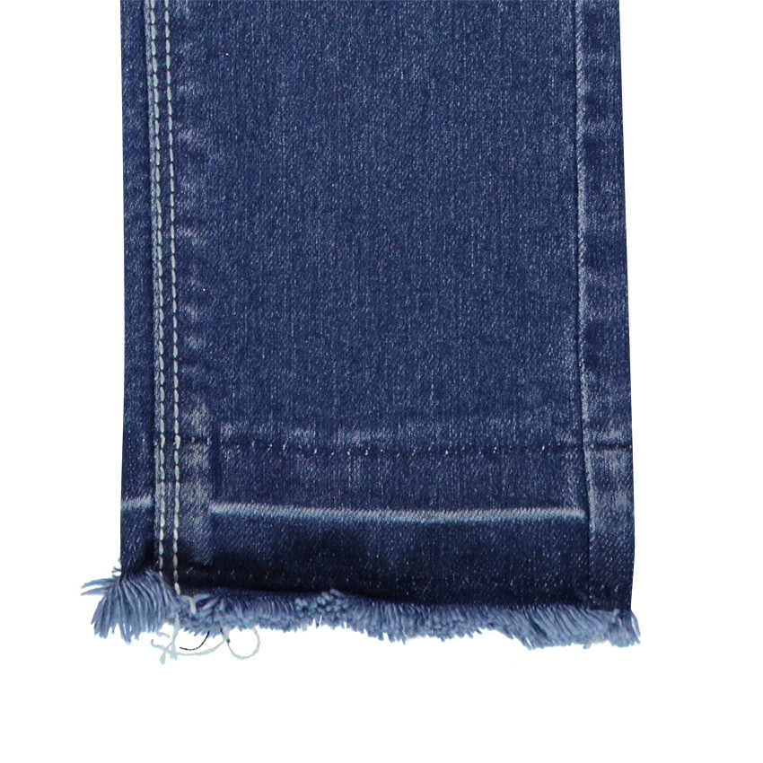 Jeans slim à patchs et franges effet used 