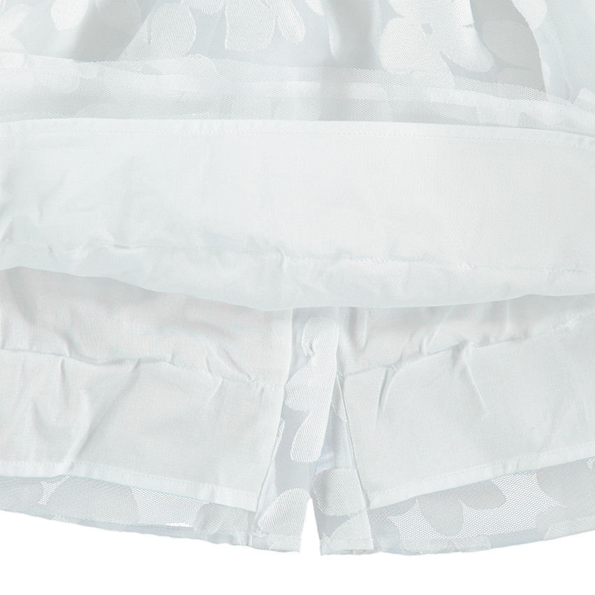 Robe de cérémonie en tulle avec fleurs en ton sur ton 