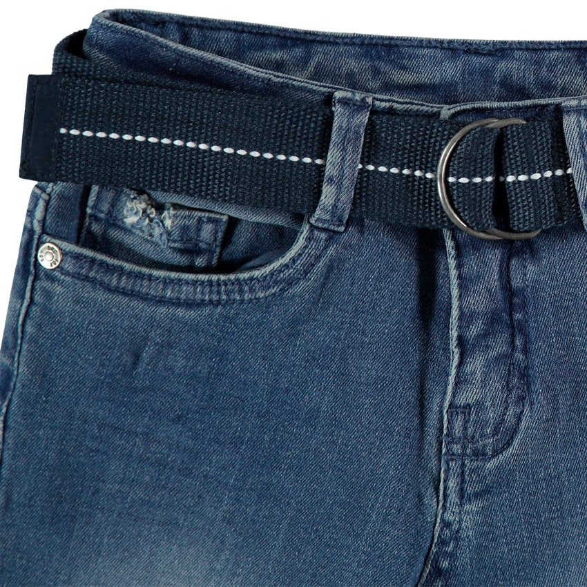 Jean effet used à trous et ceinture repositionnable 
