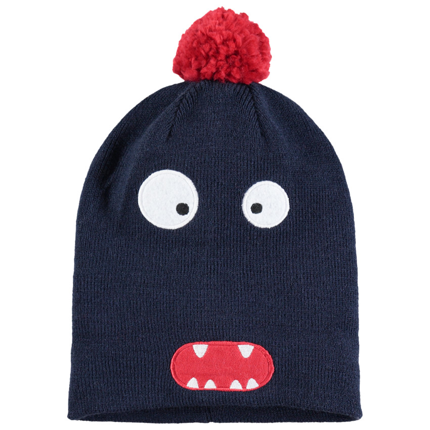 Bonnet en tricot avec bouche et yeux brodés 