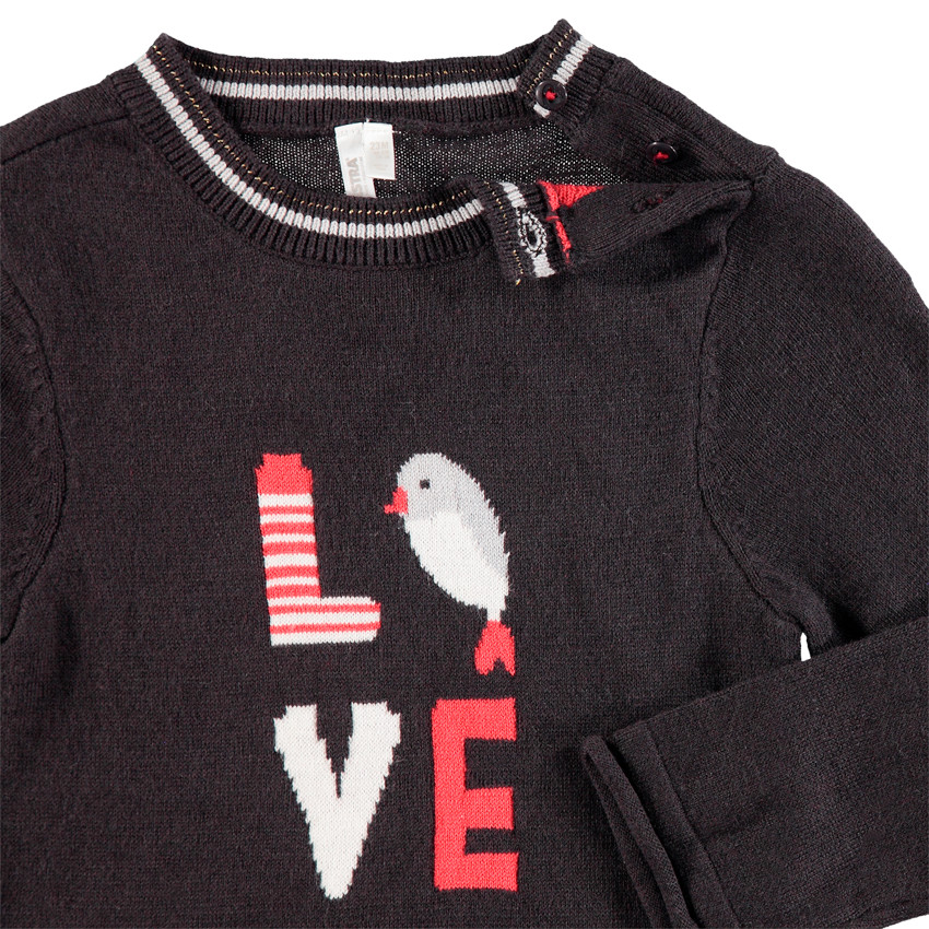 Pull en tricot avec oiseau en jacquard et volant rouge 